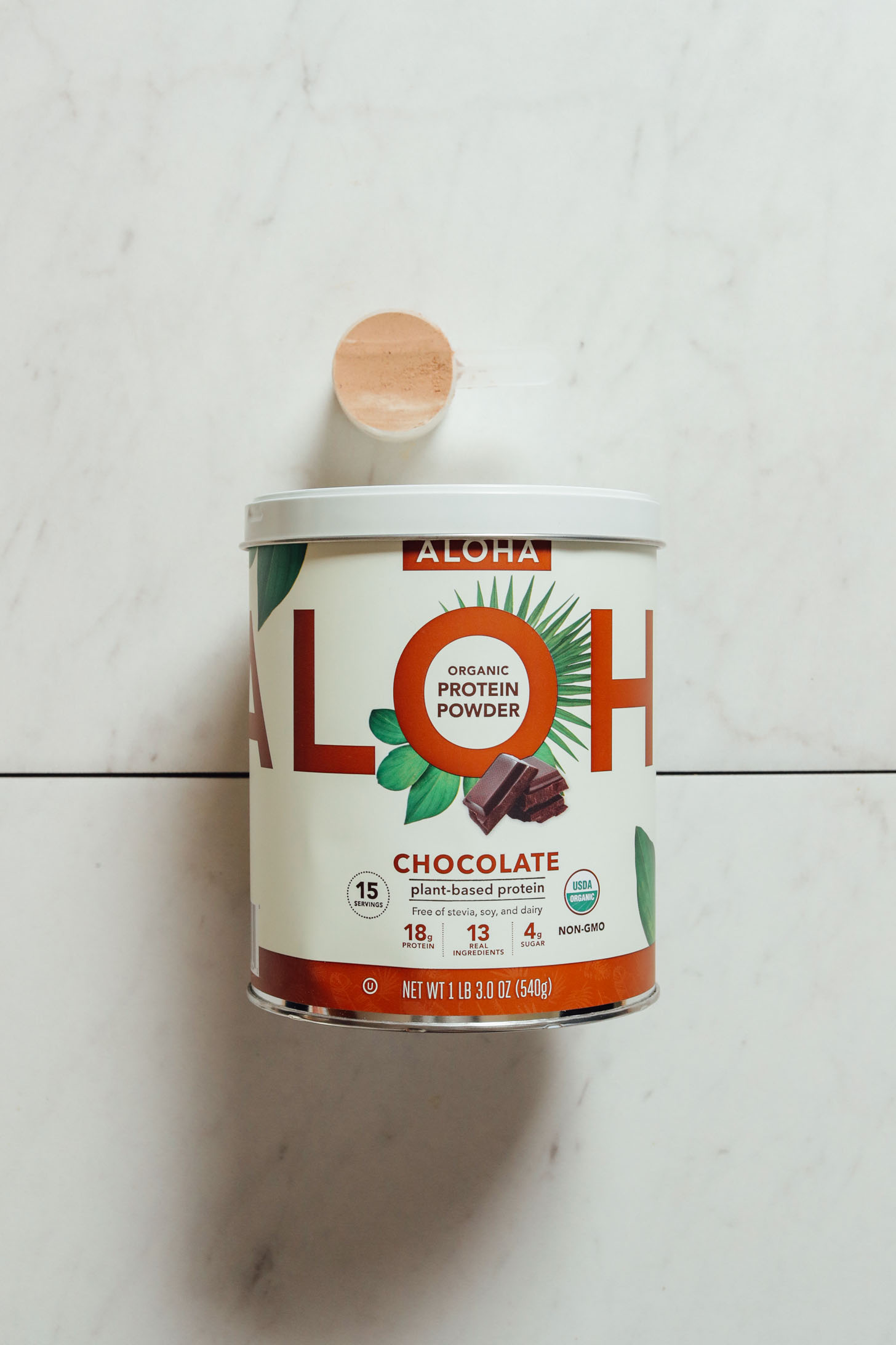 Tub of Aloha Chocolate Protein for our plant-based protein review winner