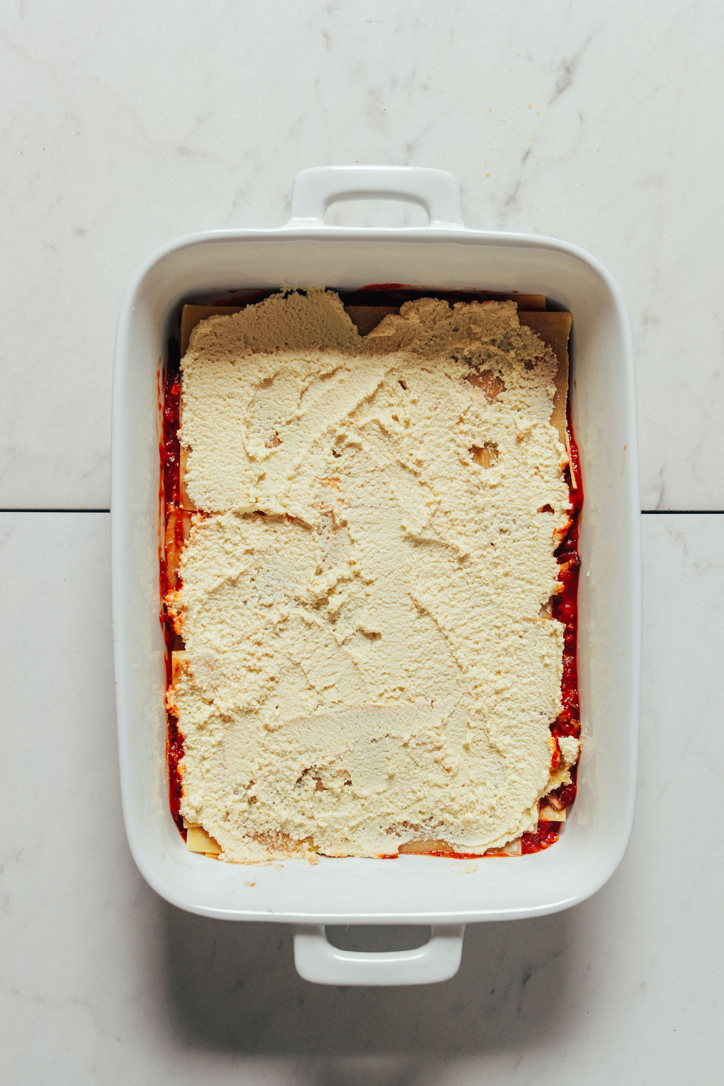 Showing the vegan cheese layer of a batch of our Easy Vegan Lasagna