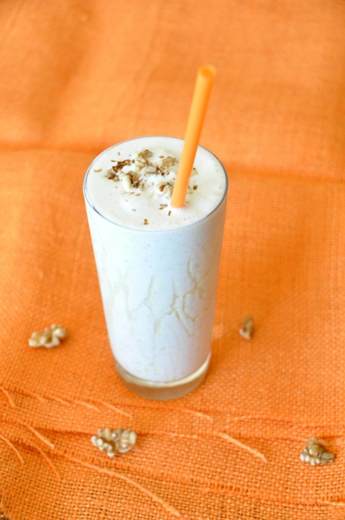 Tall glass of our Honey and Walnut Spiced Protein Shake for a refreshing dessert