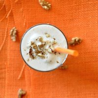 Top down shot of a glass of our Honey and Walnut Spiced Protein Shake
