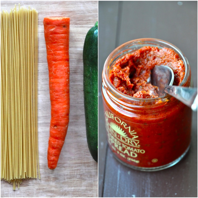 Spaghetti noodles, carrot, zucchini, and pesto for making a delicious pasta dish