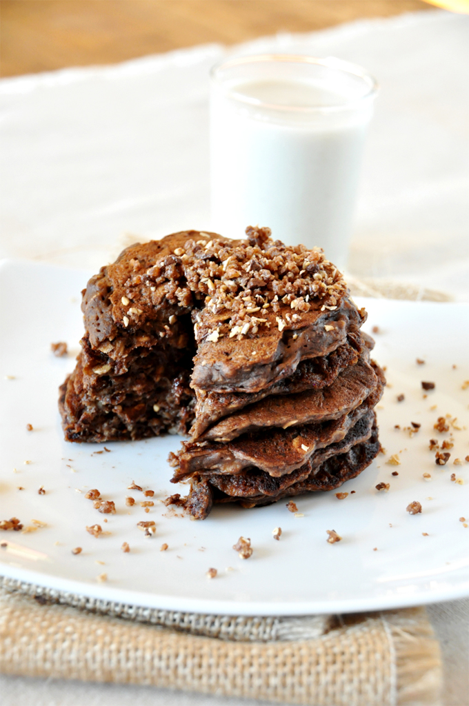 Stack of our No-Bake Cookie Pancakes recipe with a big bite removed