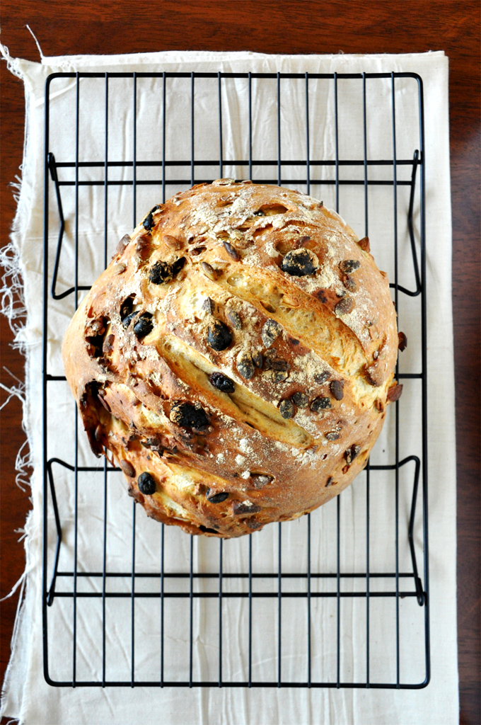 Loaf of our beautiful artisan Muesli Bread recipe cooling on a baking rack
