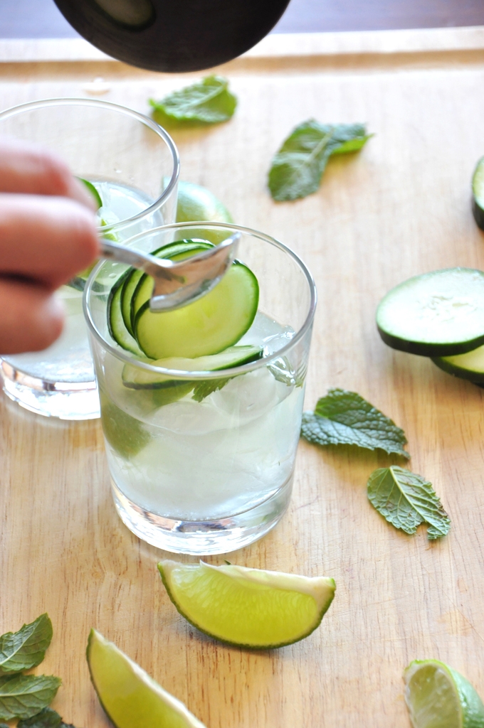 Adding cucumber slices to our cocktails for a refreshing summer drink