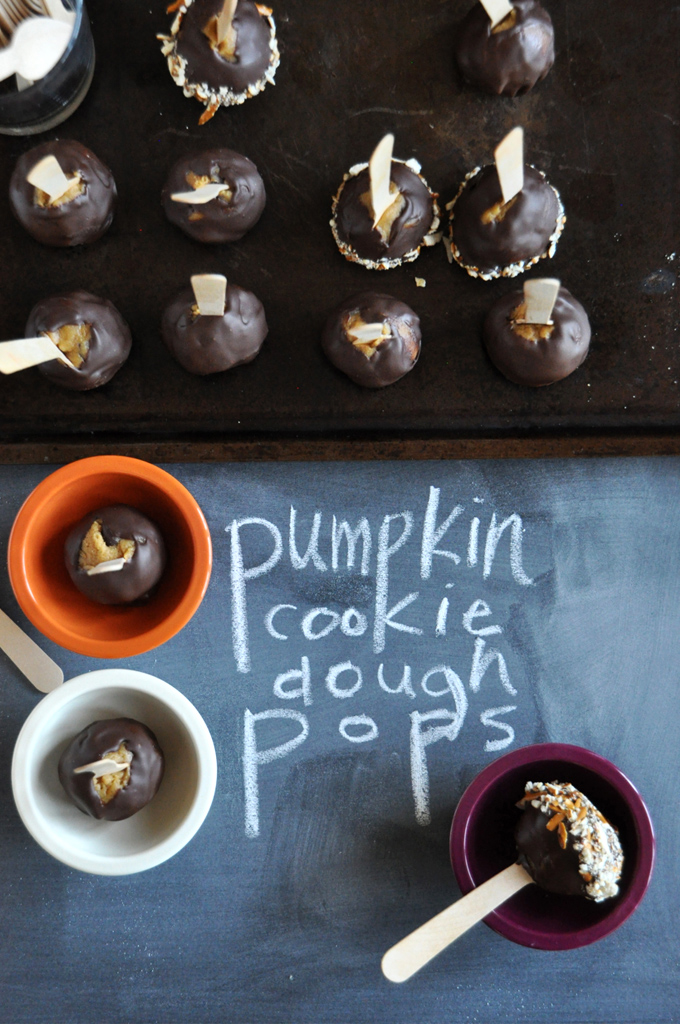 Batch of our Pumpkin Cookie Dough Pops recipe on a baking sheet and in bowls