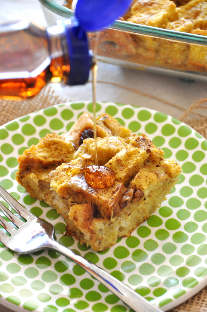 Drizzling syrup onto a square of our Pumpkin French Toast Bake recipe