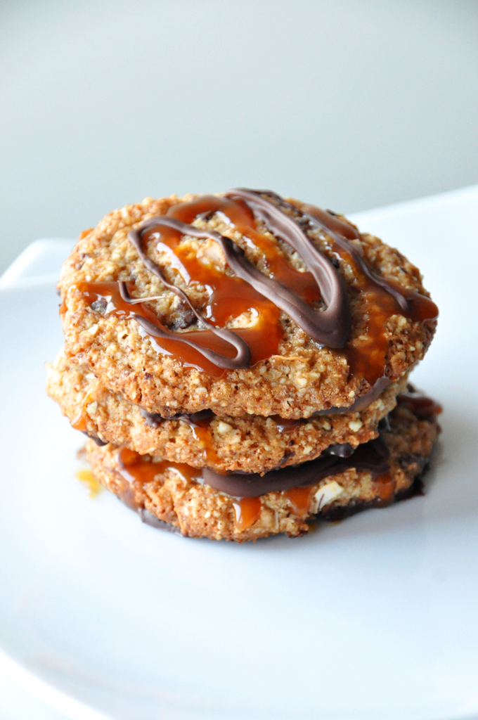 Plate with a stack of three Gluten-Free Bourbon Caramel Samoas