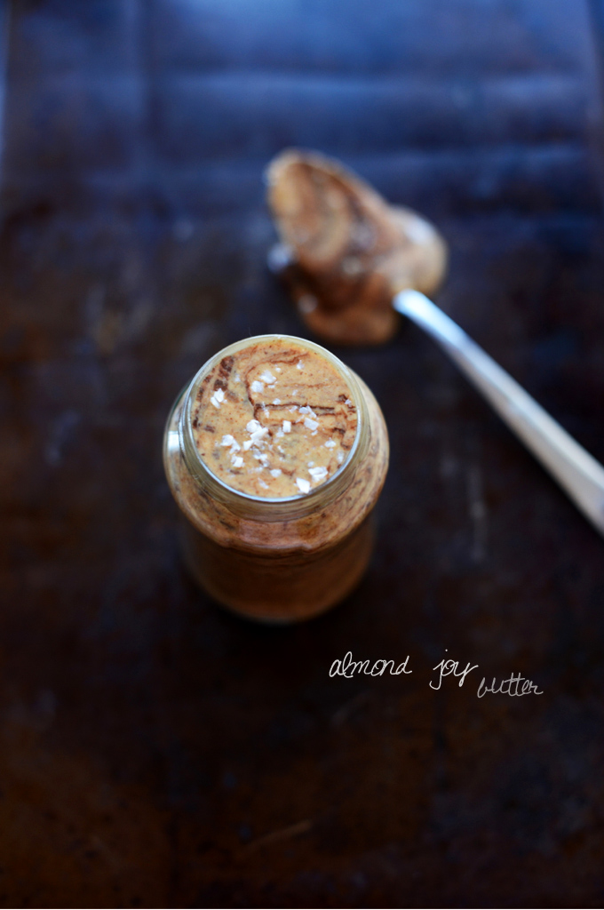 Jar filled with our homemade healthy Almond Joy Nut Butter Spread recipe