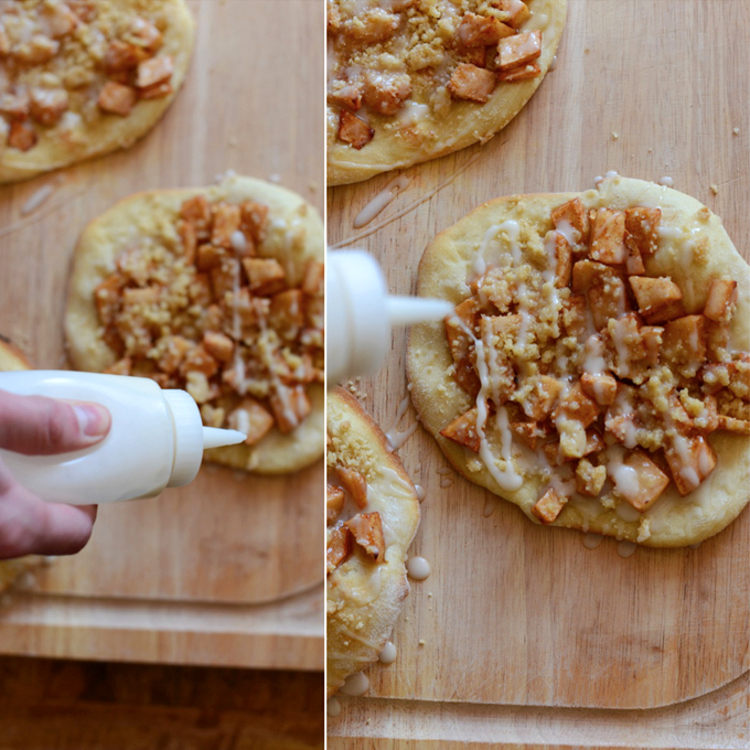 Drizzling icing onto an Apple Streusel Breakfast Pizza