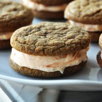 Plate of Ginger Cookie Sandwiches filled with Orange Buttercream frosting