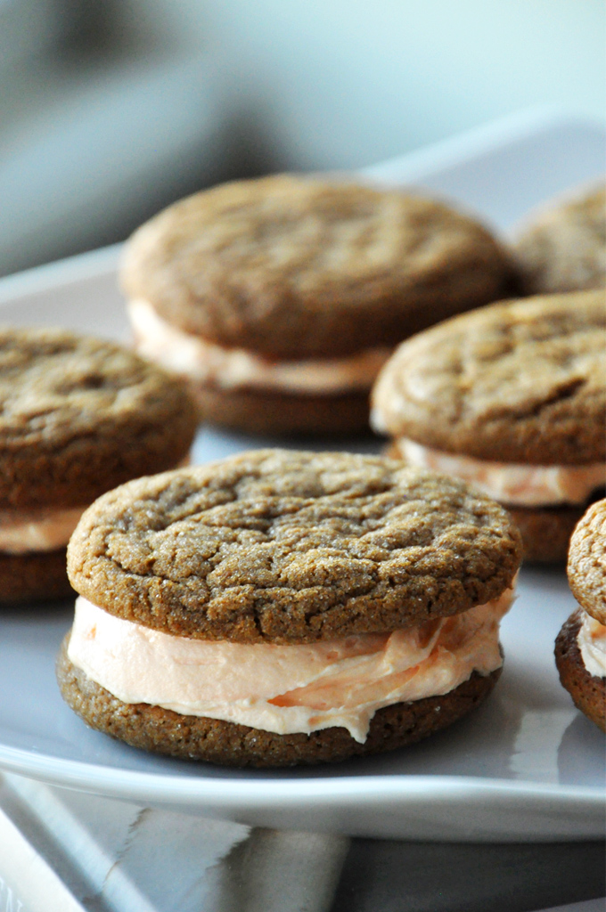 Plate of delicious Ginger Cookie Sandwiches with Orange Buttercream