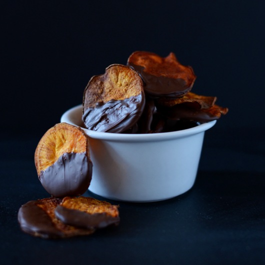 Overflowing bowl of Dark Chocolate Baked Sweet Potato Chips