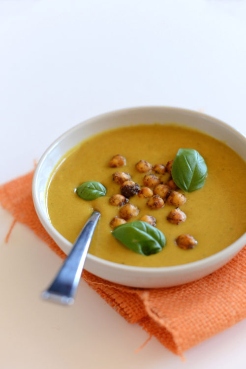 Bowl filled with Sweet Potato Coconut Curry Soup with Spiced Chickpeas for a wintertime vegan meal