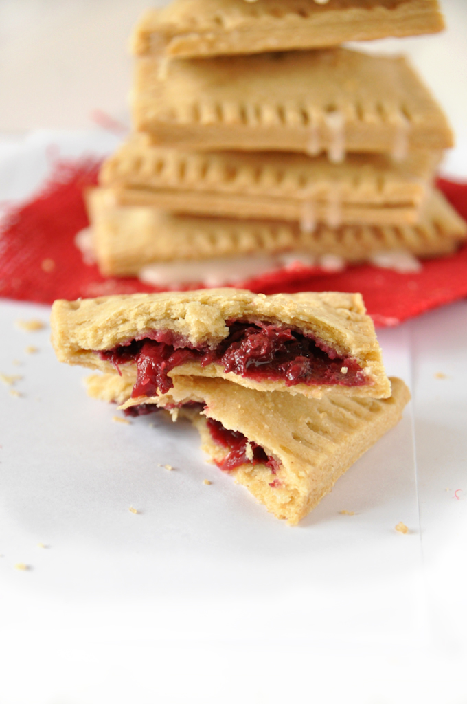 Showing the flaky crust and sweet inside of homemade Whole Wheat Berry Pop Tarts