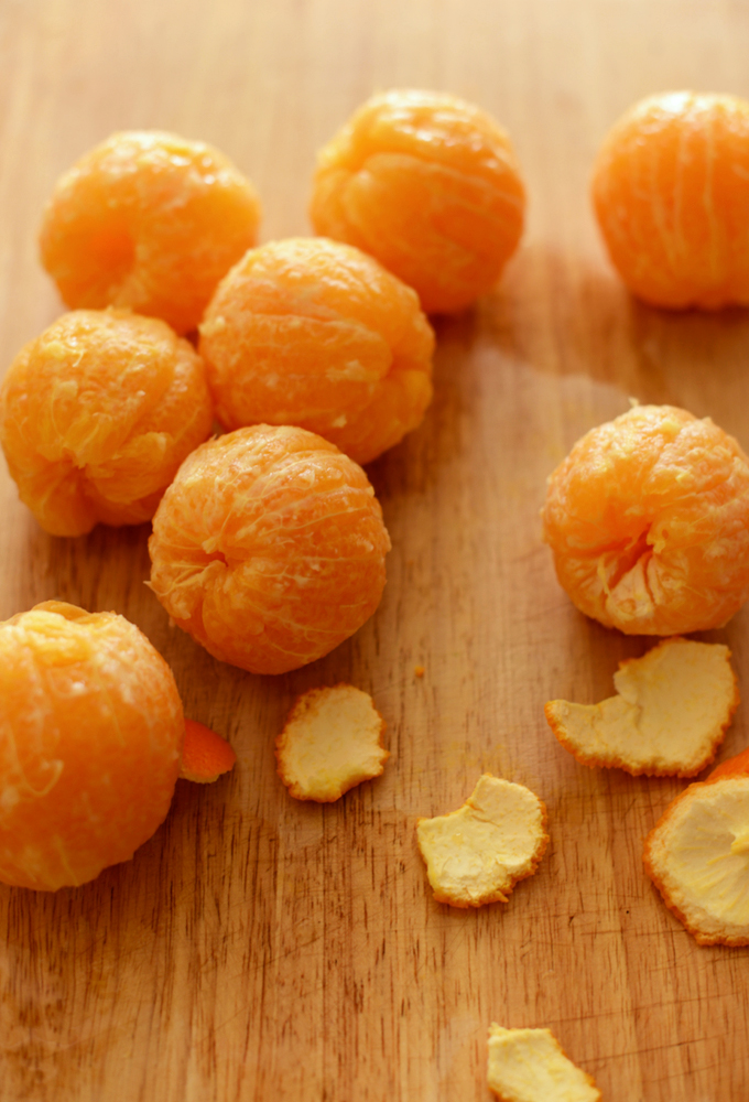 Freshly peeled mandarin oranges for making homemade jam