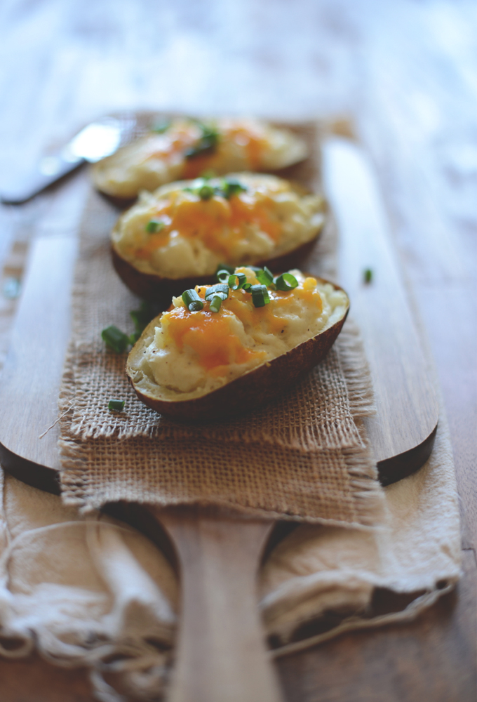 Cutting board of Twice-Baked Potatoes made with cauliflower