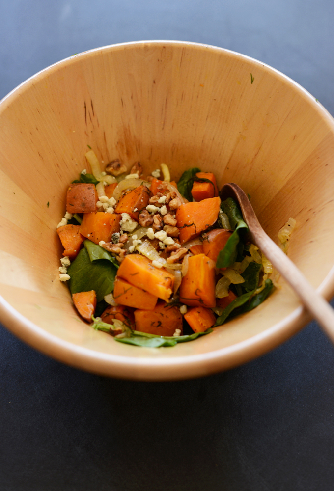 Wooden bowl of our Warm Sweet Potato & Dill Salad recipe