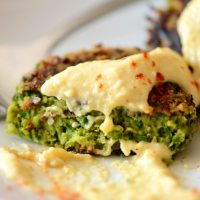 Vegan Collard Green Falafel topped with hummus and paprika