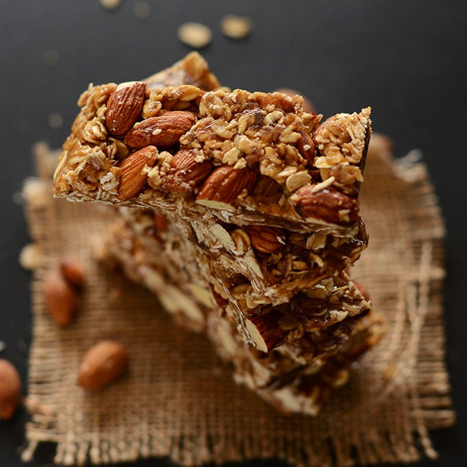 Cascading stack of Vegan Granola Bars made with almonds and oats