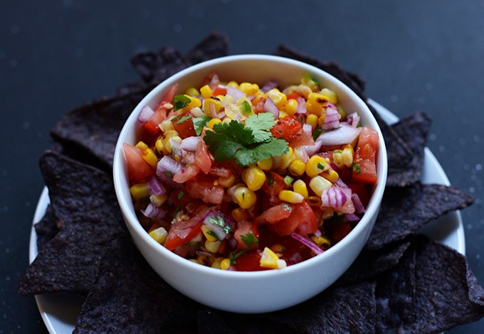 Bowl of our Grilled Corn Salsa Recipe with chips