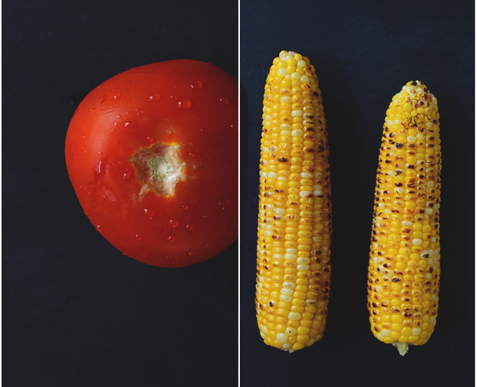 Fresh tomato and ears of grilled corn for making simple Grilled Corn Tomato Salsa