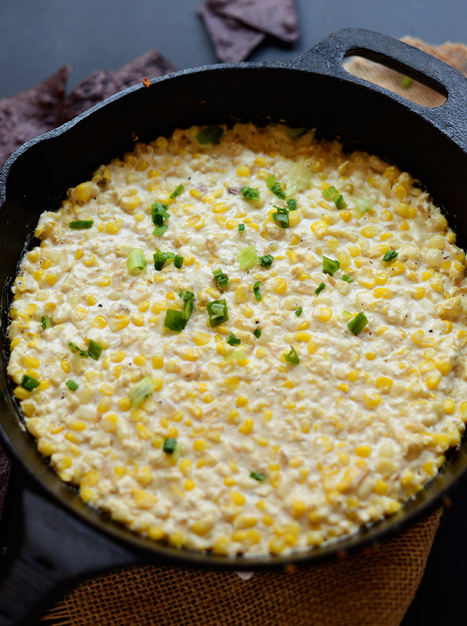 Cast-iron skillet filled with homemade Corn and Cotija Cheese Dip