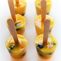 Wooden popsicle sticks in lines of All-Fruit Homemade Popsicles