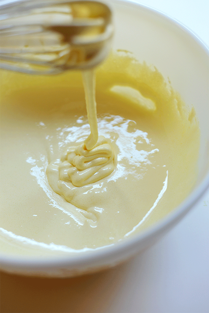 Dairy-Free Ice Cream batter streaming off of a whisk