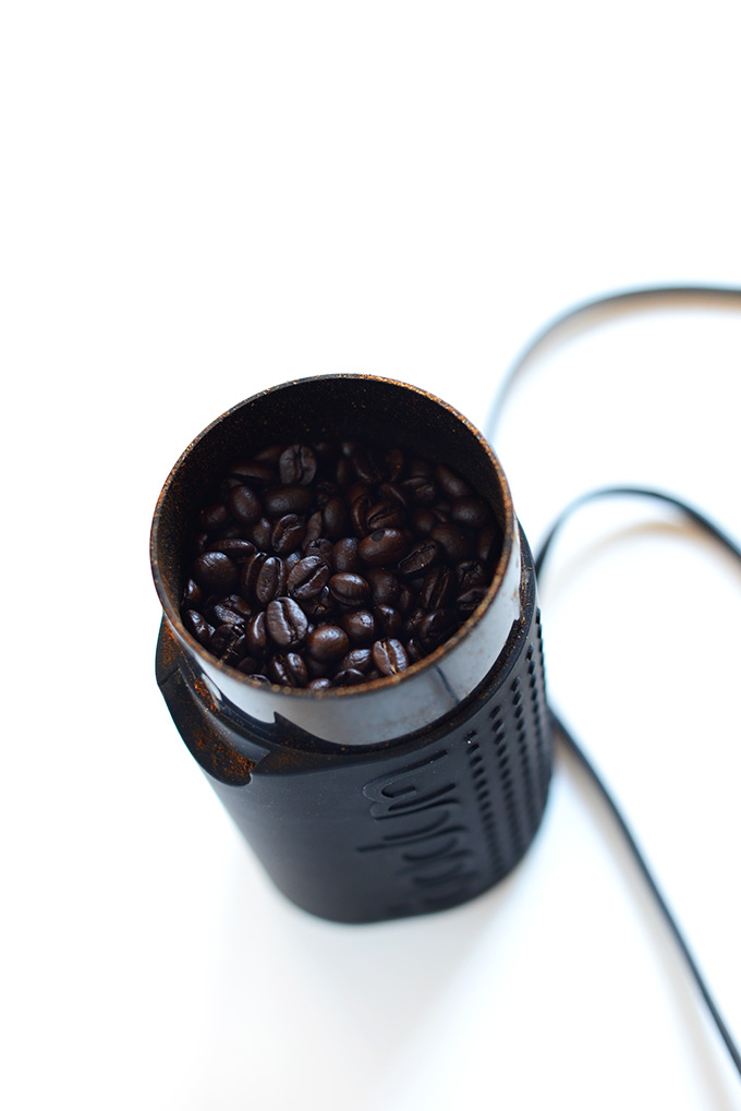 Coffee grinder with whole French Roast Coffee beans