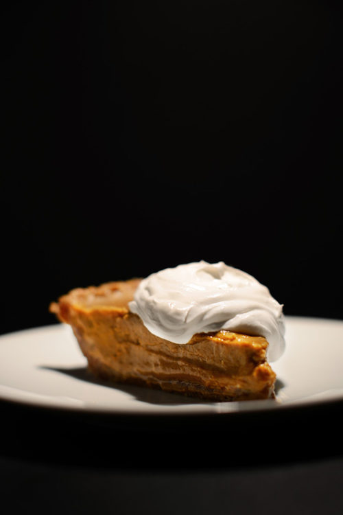 A slice of our Vegan No-Bake Pumpkin Pudding Pie recipe resting on a plate