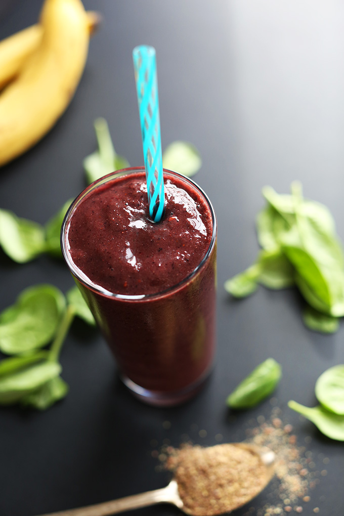 Tall glass of our 5-Ingredient Detox Smoothie made with spinach and banana