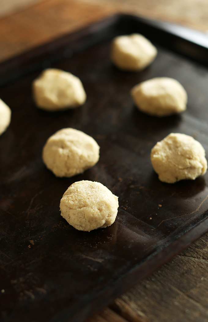 Baking sheet with balls of fluffy Gluten-free Sugar Cookie dough