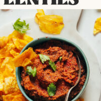 Bowl of smoky 1-pot refried lentils with text above it that says just 30 minutes