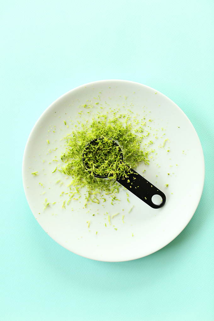 Plate of lime zest for adding to Vegan Key Lime Pies