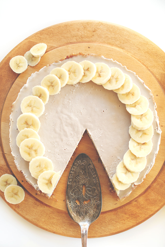 Raw Vegan Banana Cream Pie with a slice removed