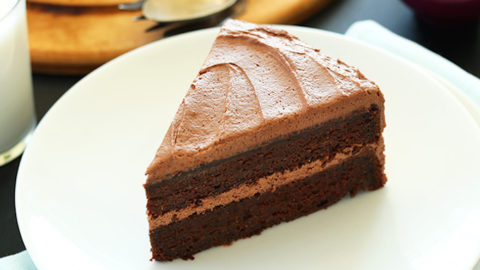Slice of Vegan Chocolate Cake with Chocolate Frosting