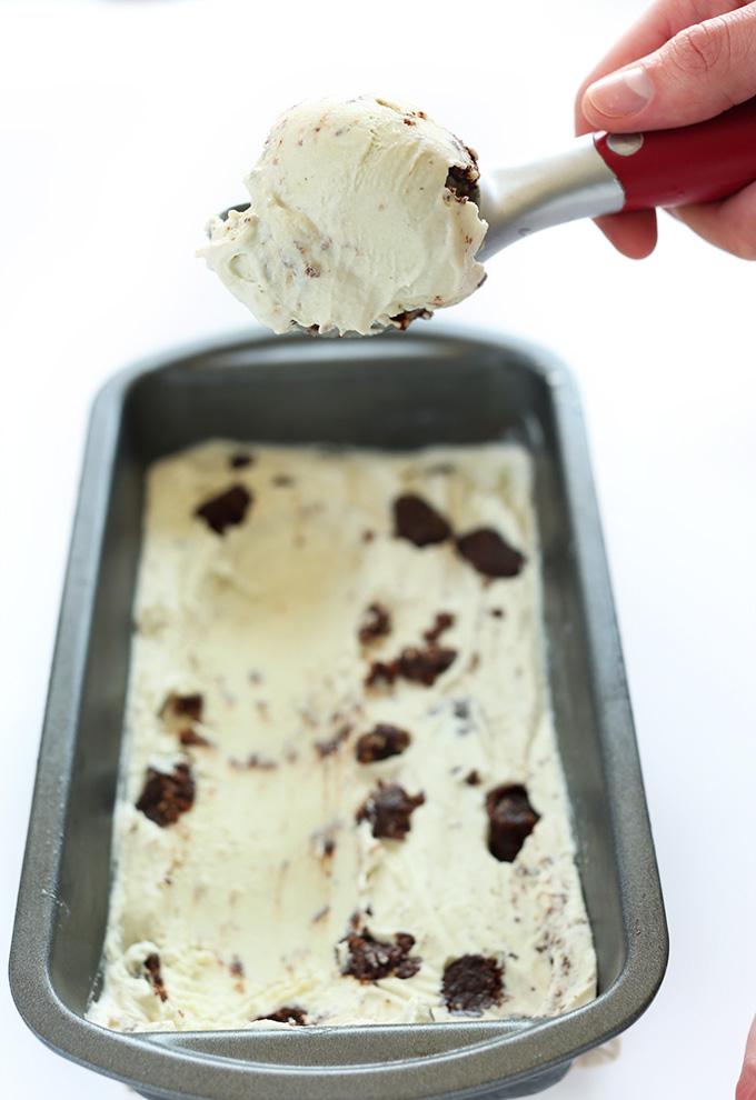Grabbing a scoop of homemade Vegan Mint Brownie Ice Cream