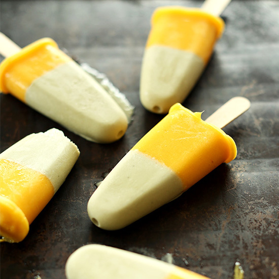 Baking sheet with homemade two layer Mango Green Tea Pops