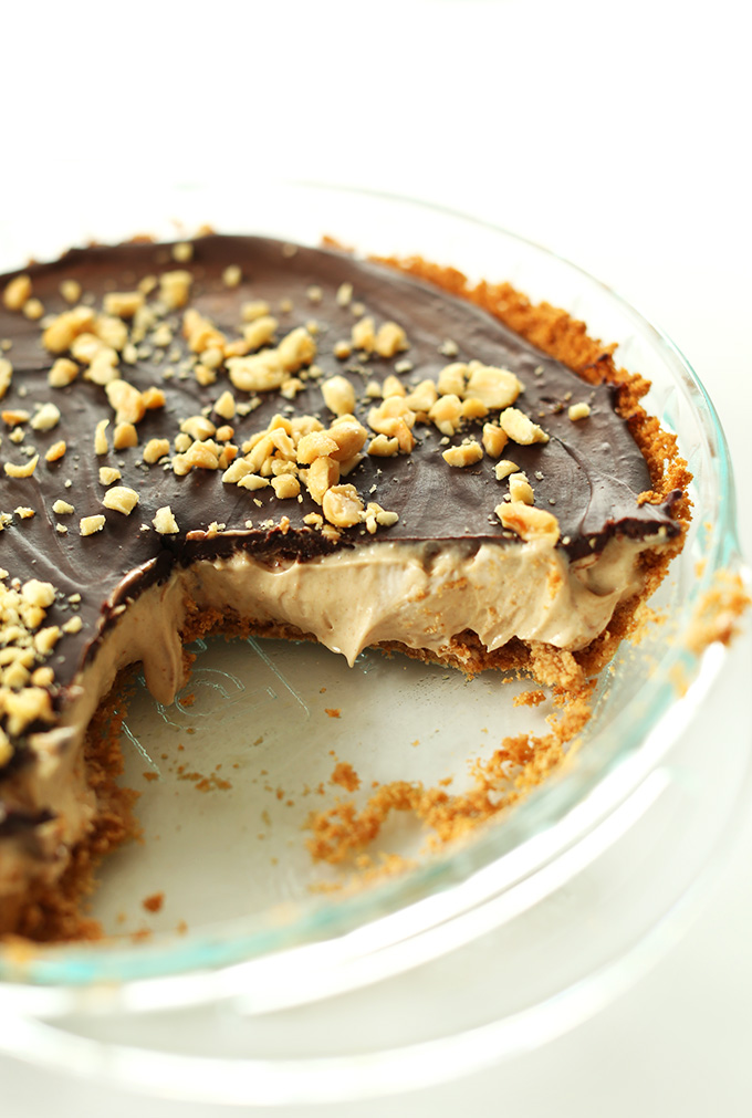 Vegan Peanut Butter Cup Pie! PB Mousse filling, chocolate ganache top and an easy graham crust. SO so creamy and delicious!