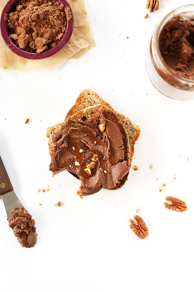 Cocoa powder, jar of Brownie Batter Spread and gluten-free toast