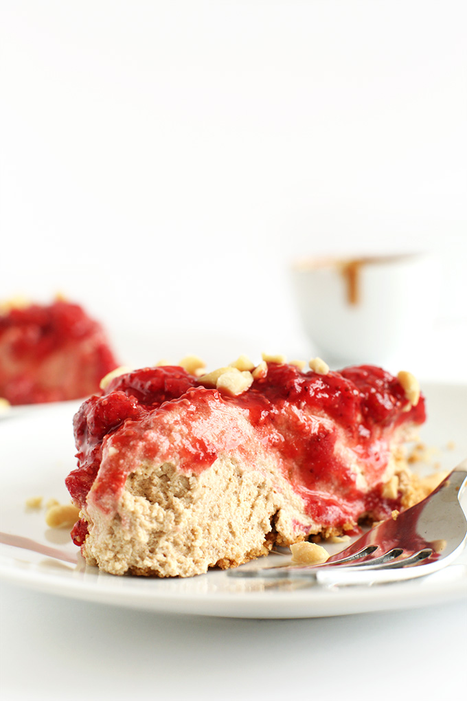 Slice of delicious Vegan PB & J Pie with a strawberry topping