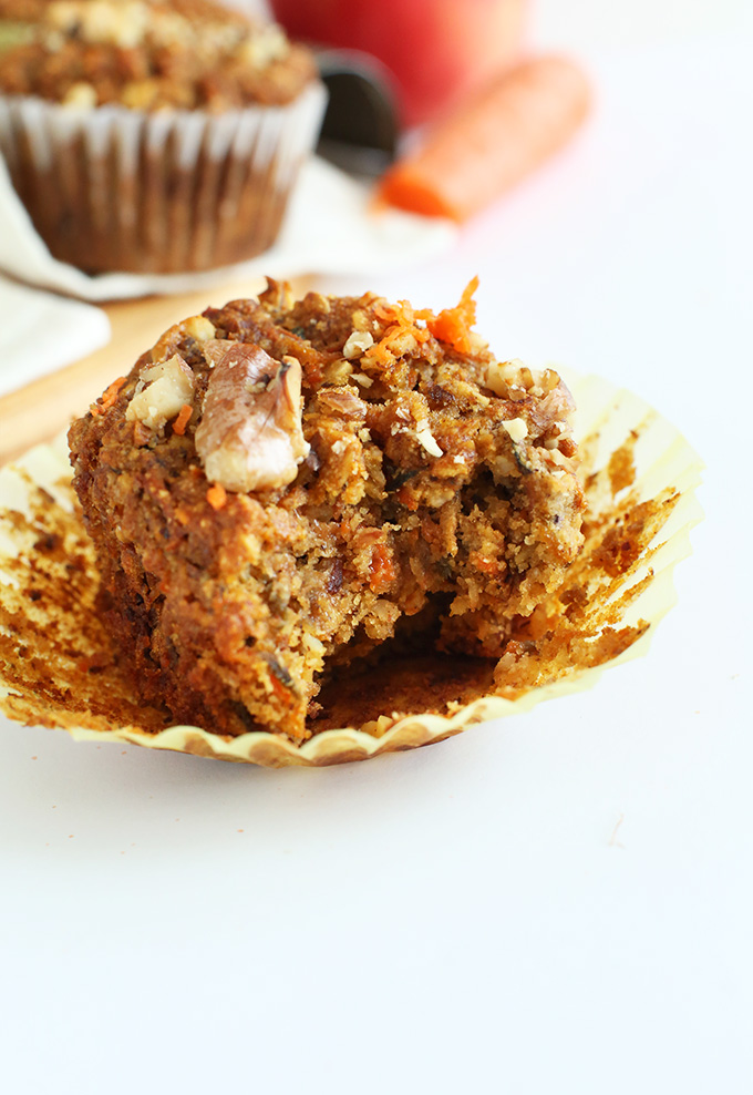 Close up shot revealing the moist texture of a partially eaten carrot muffin