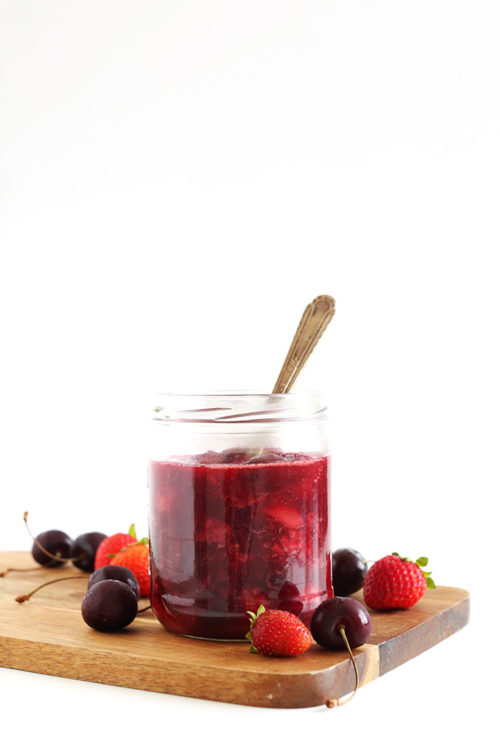 Jar of simple fruit compote made with fresh fruit and orange juice