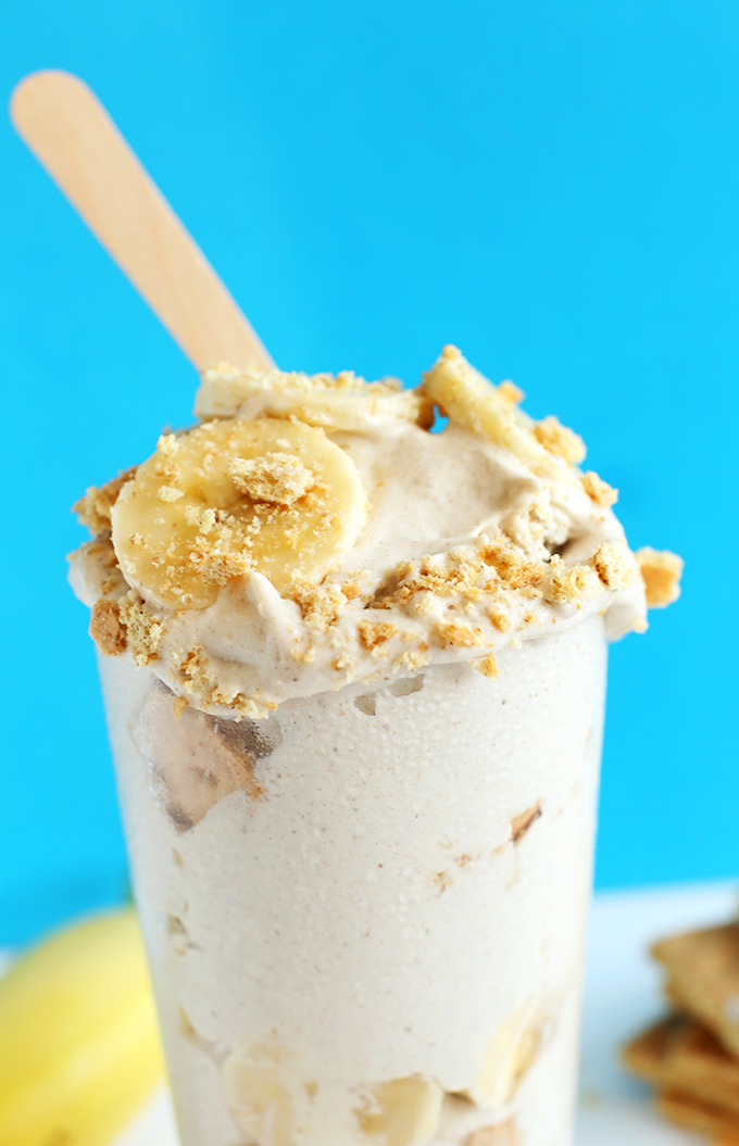 Glass filled with our recipe for Vegan Banana Cream Pie Blizzards