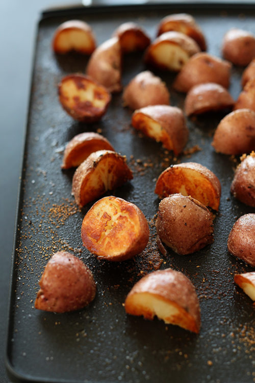 Batch of our crispy vegan Breakfast Potatoes on a baking sheet