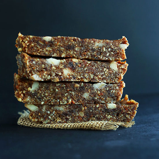 Stack of homemade gluten-free vegan Apple Pie Date Bars 