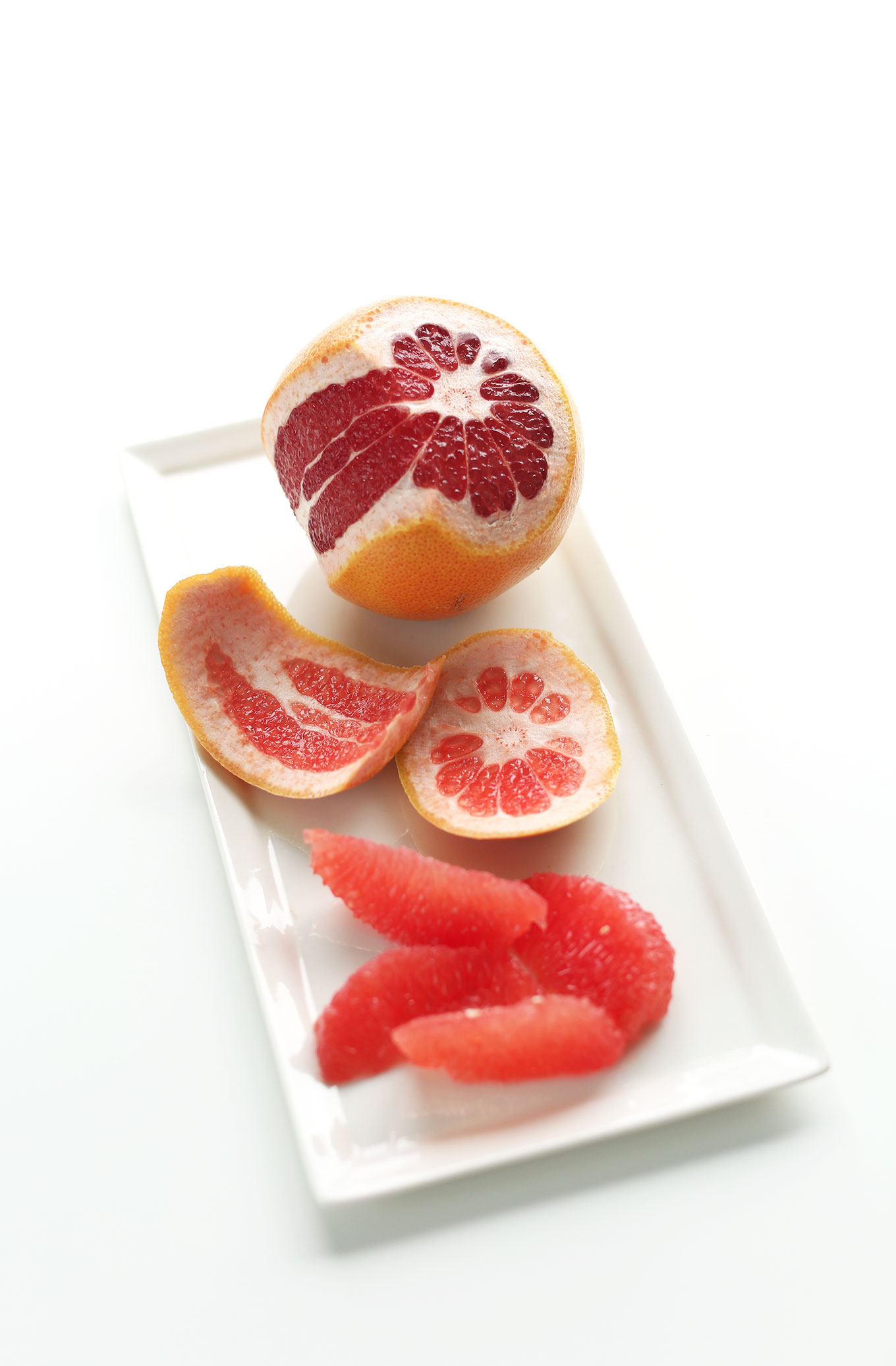 Platter of peeled and sliced grapefruit