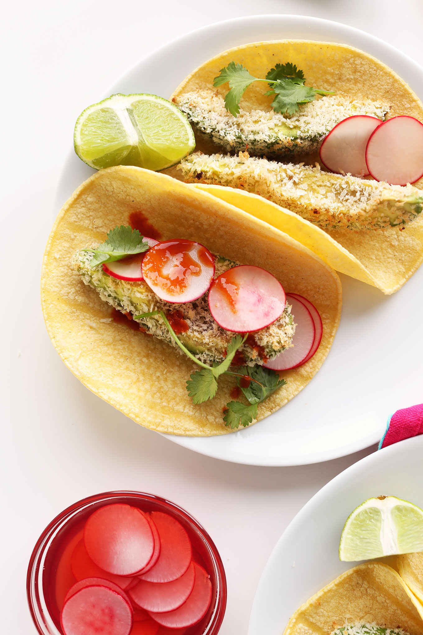 Close up shot of a plate of our Panko Baked Avocado Tacos recipe
