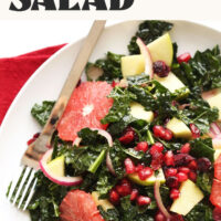 Plate of our simple, 30-minute kale salad recipe with grapefruit and pomegranate