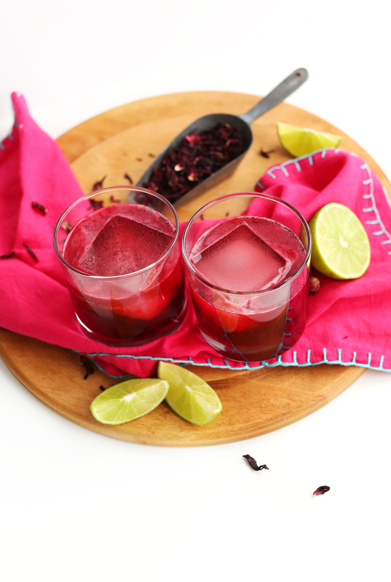 Hibiscus Margaritas resting on a cutting board for a refreshing summer drink